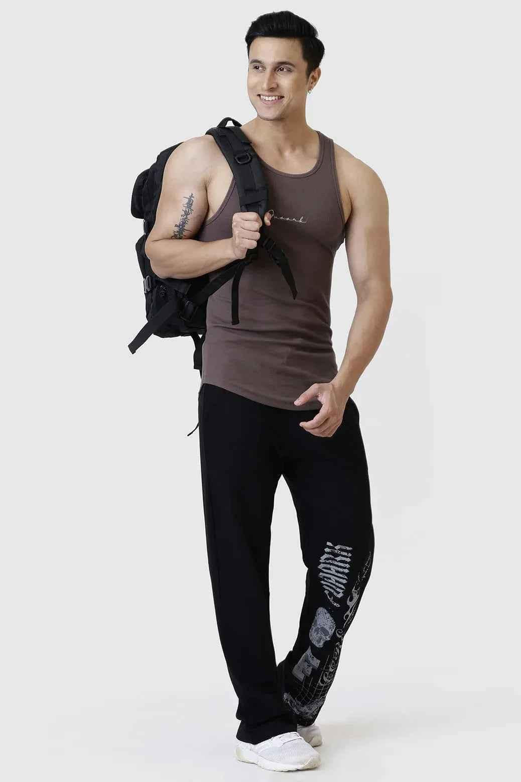 Brown ribbed tank top from Fuaark Nz, a comfortable sleeveless tank top with a fitted ribbed design.