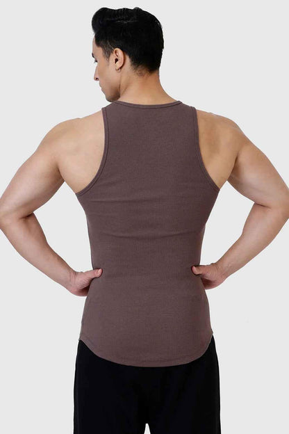 Brown ribbed tank top by Fuaark Nz, close-up of the fitted, textured fabric on a sleek sleeveless design.