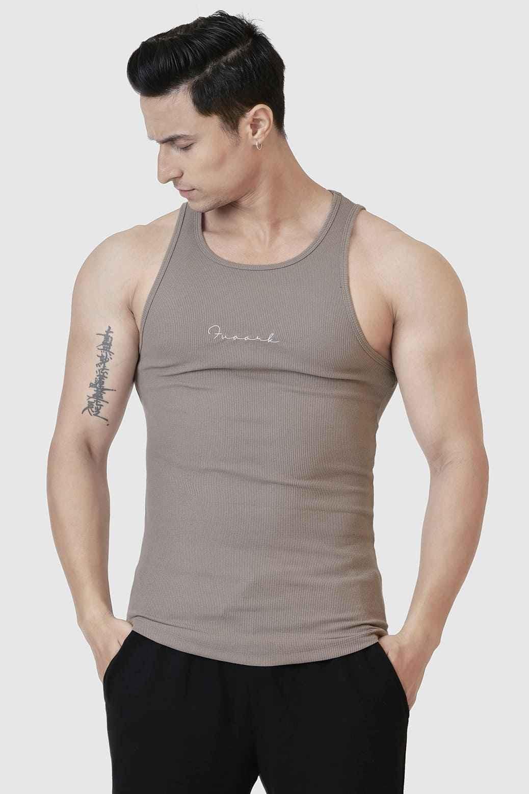 Warm beige ribbed tank top from Fuaark Nz, casual sleeveless top with fitted ribbed design for comfort and style.