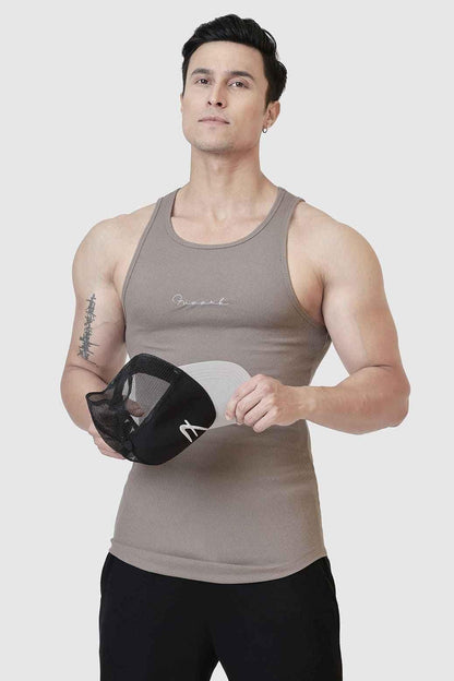 Warm beige ribbed tank top by Fuaark Nz featuring a fitted, sleeveless design perfect for casual wear.