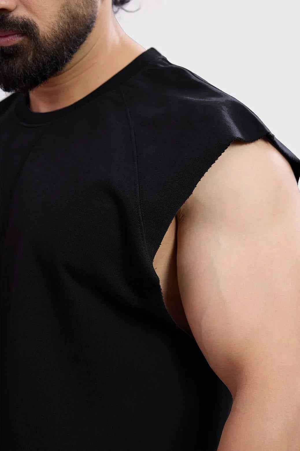 Black Shell Raw Capsleeves Tank Top by Fuaark Nz, close-up of sleeveless style with raw edge details