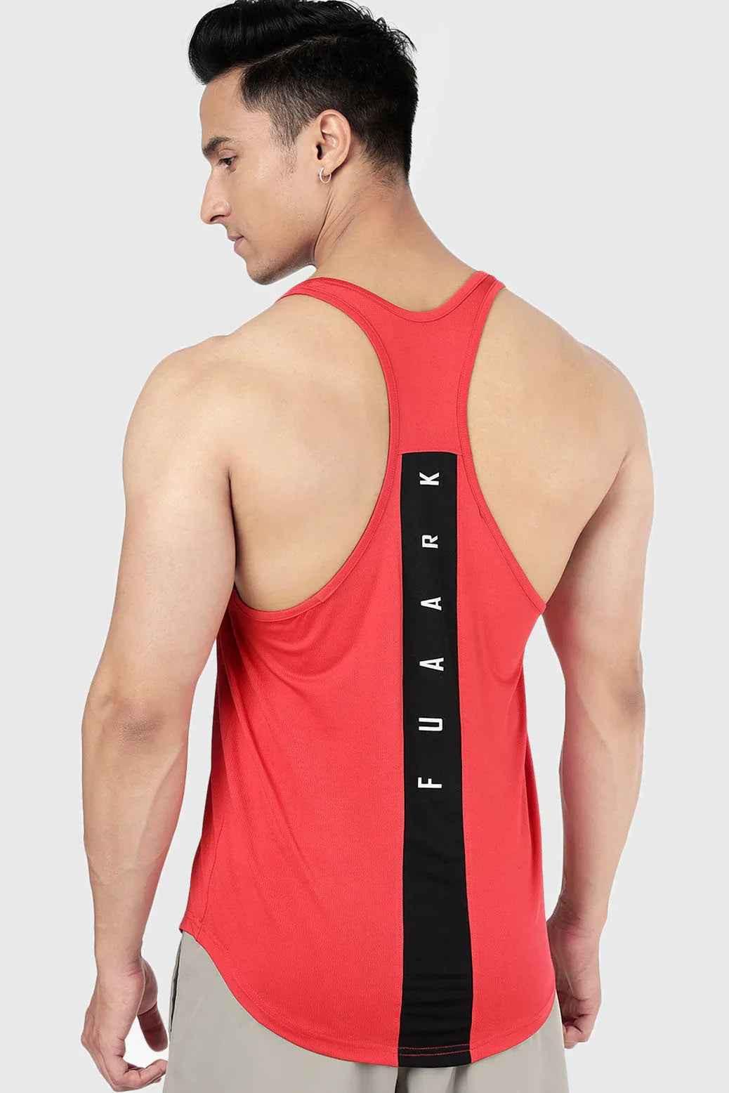 Red Surge Stringer tank top by Fuaark Nz displayed on a mannequin, highlighting its fitted sleeveless design.