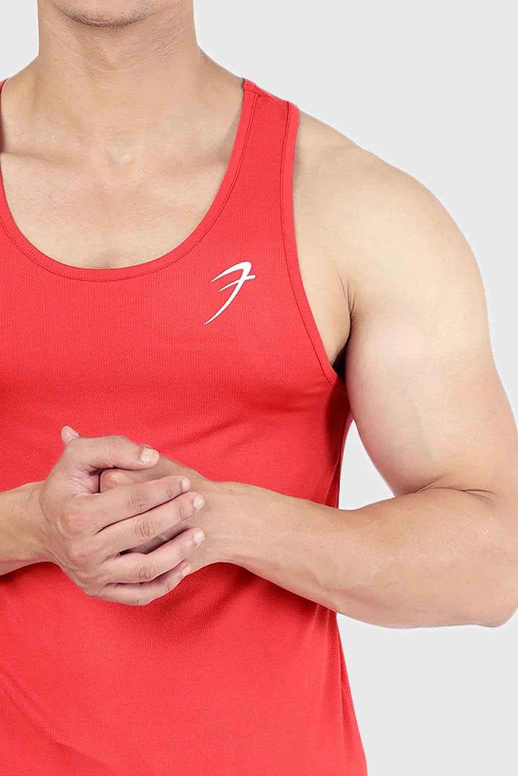 Red Surge Tank Top by Fuaark Nz, sleeveless athletic tank with a sporty fit, ideal for workouts and casual wear.