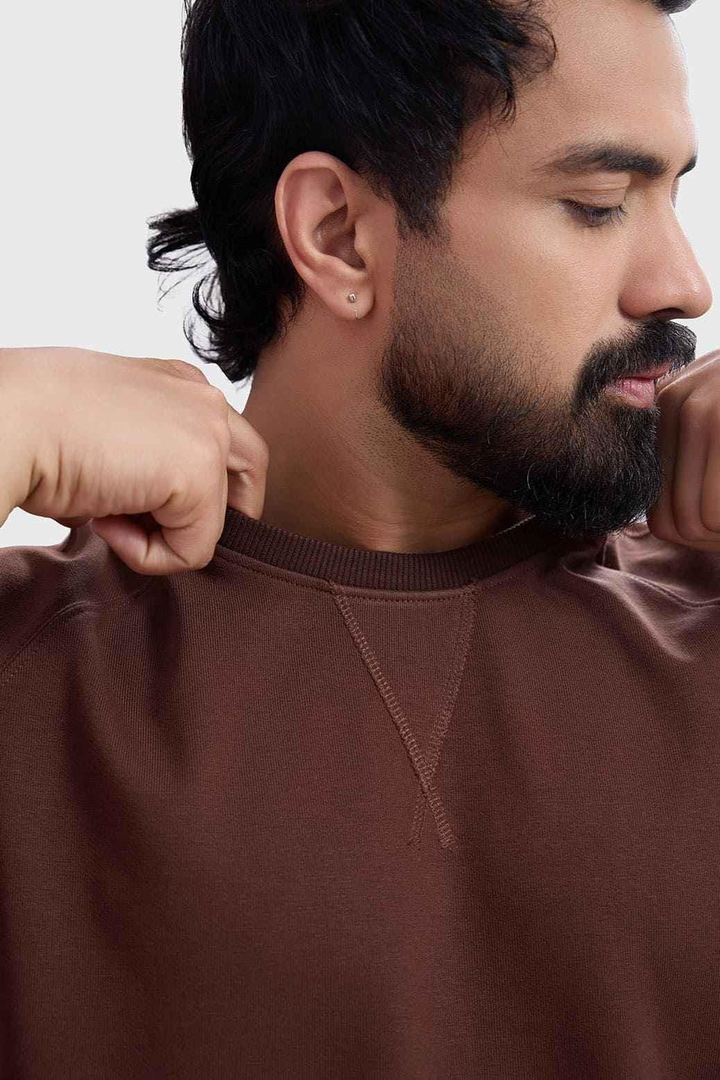Brown capsleeve workout tank top by Fuaark NZ, designed for active wear and athletic training, displayed on a model.