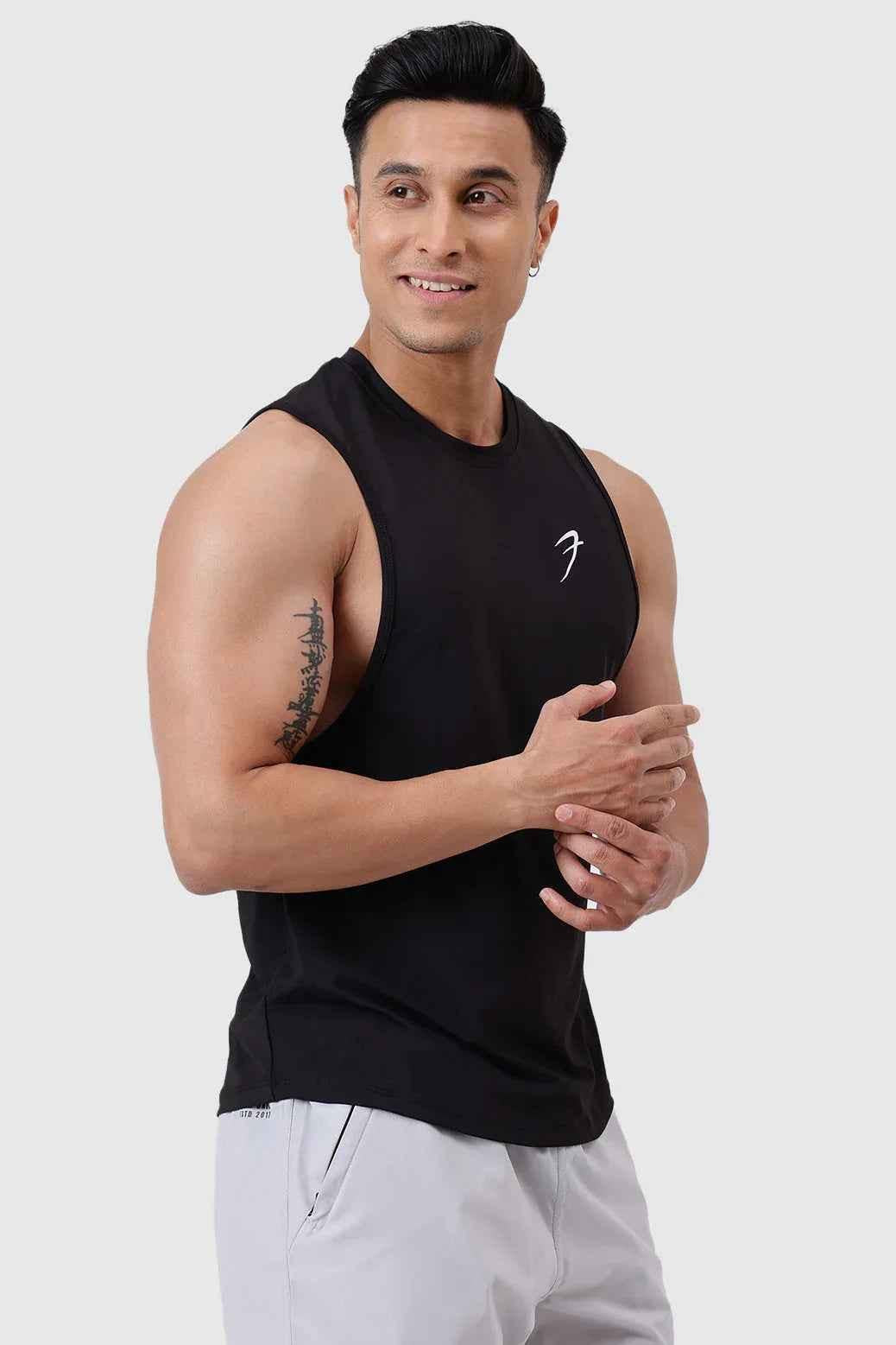 Black Urban Deep Arm Tank Top by Fuaark Nz, stylish and comfortable sleeveless shirt for casual wear.