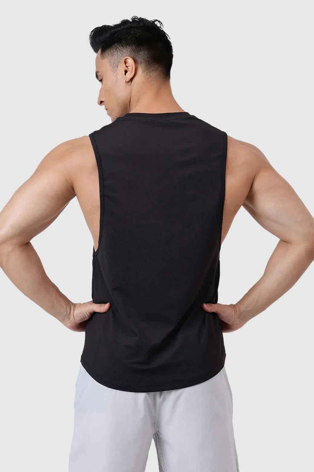 Fuaark NZ Urban Deep Arm Tank Top in black, stylish and comfortable sleeveless tank for casual wear in a modern wardrobe.
