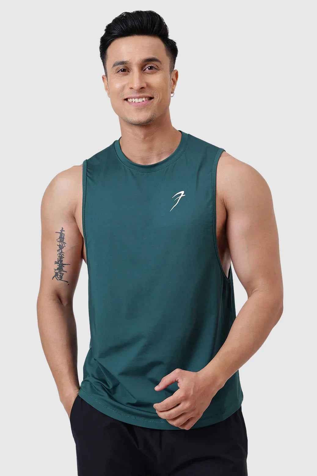Emerald green Urban Deep Arm Tank top by Fuaark Nz, sleeveless design, casual fit, perfect for summer and active wear.