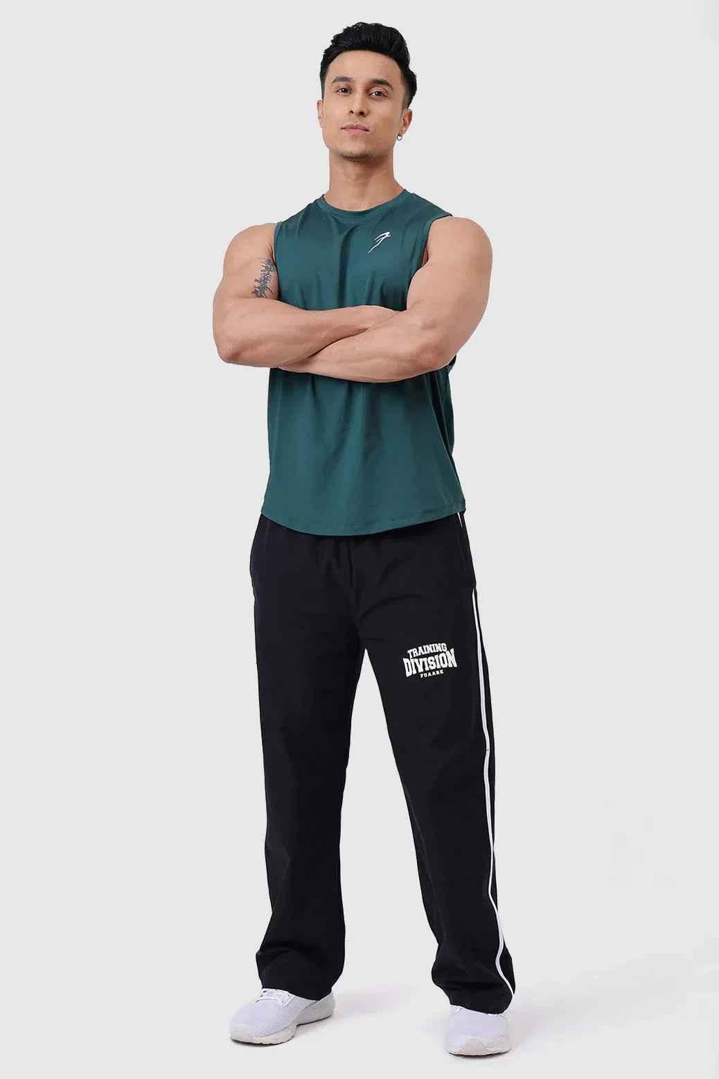 Emerald green Urban Deep Arm Tank top by Fuaark Nz, sleeveless design, casual fit, suitable for warm weather.