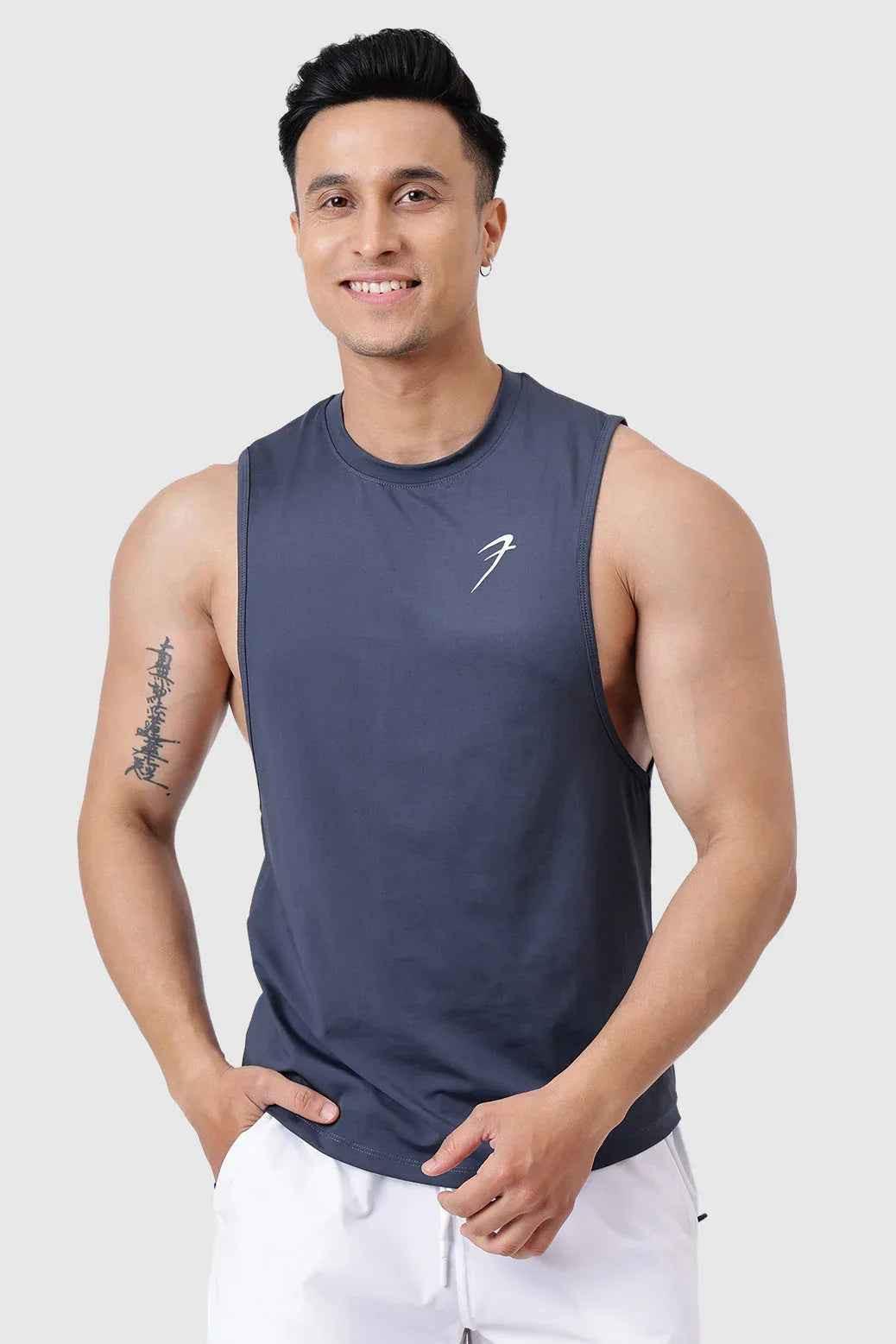 Dark grey Fuaark Nz Urban Deep Arm Tank Top for men, shown on a model with a fitted sleeveless design and casual style.