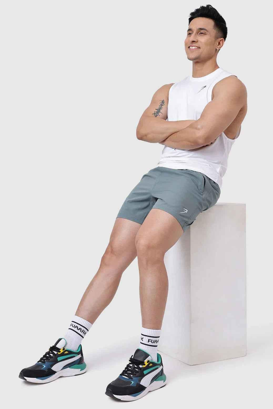 White Urban Deep Arm Tank Top by Fuaark NZ, sleeveless casual tank shirt with a relaxed fit and deep armholes.