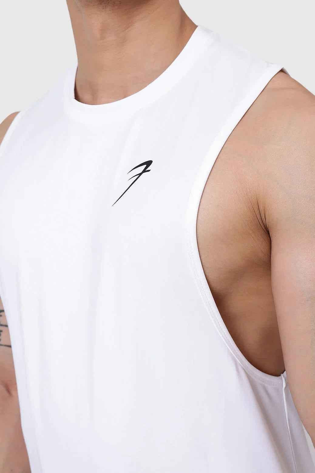 White Urban Deep Arm Tank Top by Fuaark Nz, sleeveless men's fashion tank with a relaxed fit and deep armholes.