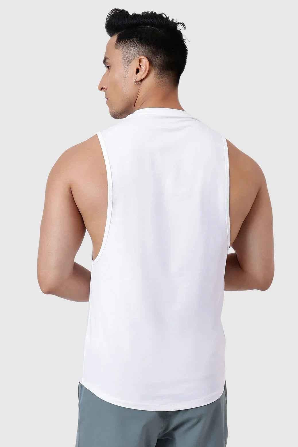 White Urban Deep Arm Tank Top by Fuaark Nz showing the sleeveless design and fitted style on a plain background.