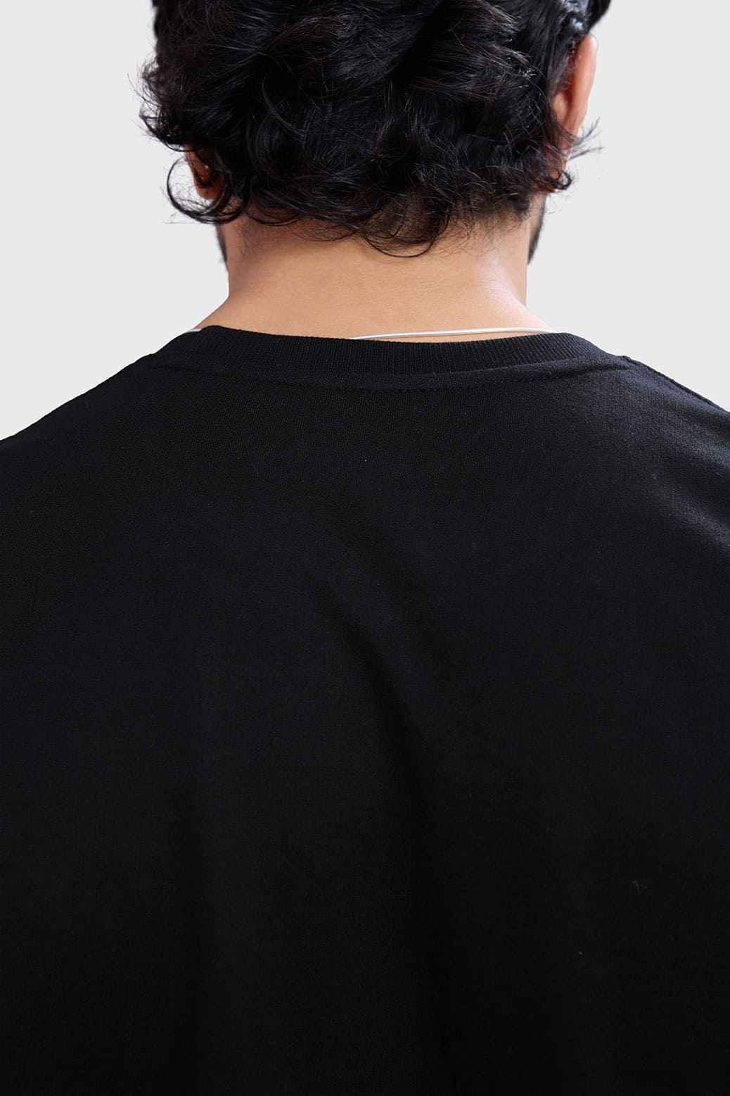 Fuaark NZ black cap-sleeves tank top, casual and comfortable, shown on a model with a fitted style perfect for everyday wear.