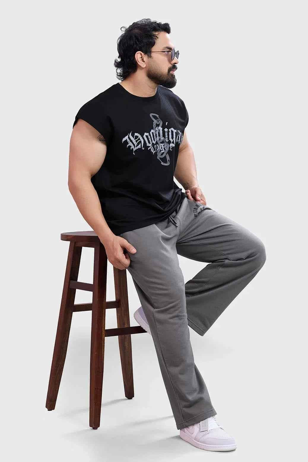 Black Hoonigans capsleeves tank top by Fuaark Nz, showcasing a casual, comfortable sleeveless design for everyday wear.