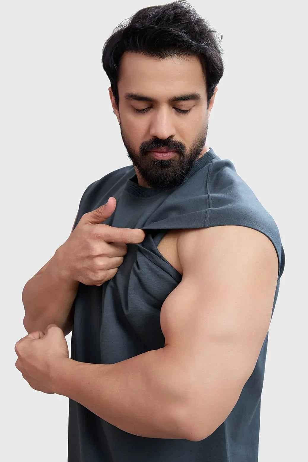 Dark grey Fuaark Nz tank top with capsleeves, designed for workout performance and comfort.
