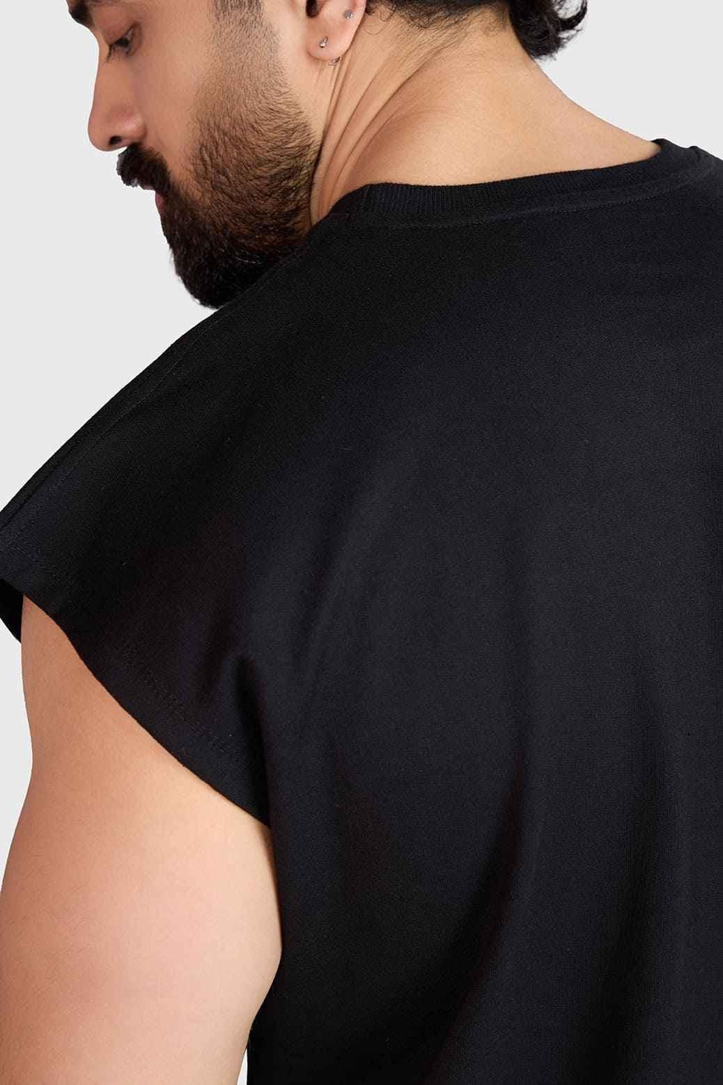 Heavyweight black tank top with cap sleeves by Fuaark Nz, close-up of the sleeveless, fitted design and durable fabric.
