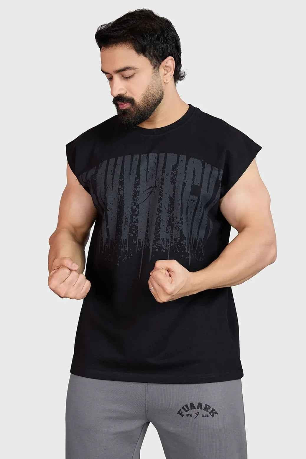Heavyweight black tank top with cap sleeves from Fuaark NZ, close-up showing soft fabric and comfortable fit.