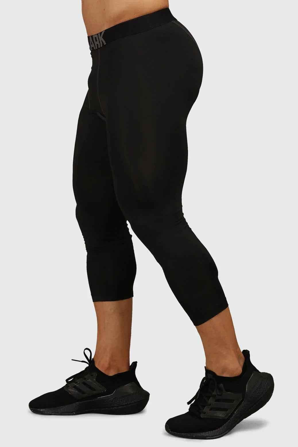 Black compression tights by Fuaark NZ featuring a snug fit and supportive design, ideal for athletic and everyday wear.