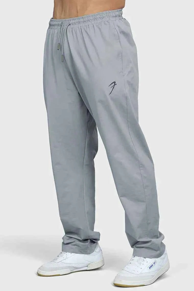 Fuaark Nz smart casual light grey track pants, stylish and comfortable for everyday wear, made from soft, breathable fabric.