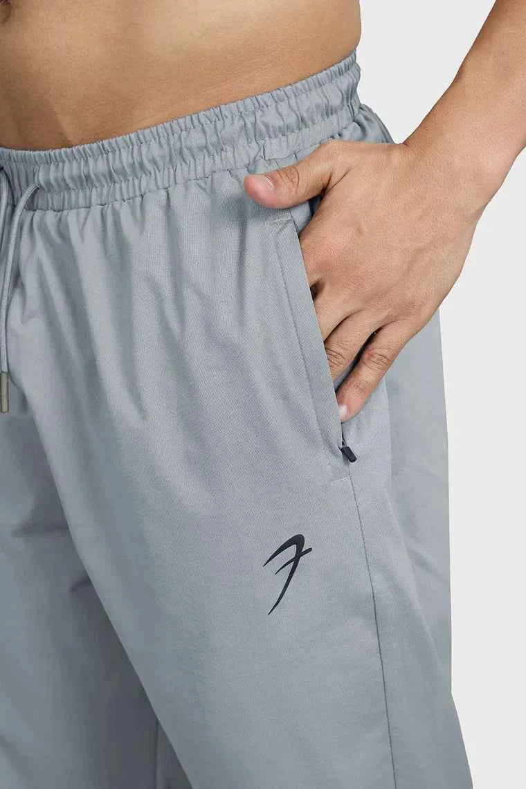 Fuaark Nz smart casual light grey track pants with a relaxed fit and elastic waistband, suitable for everyday wear.