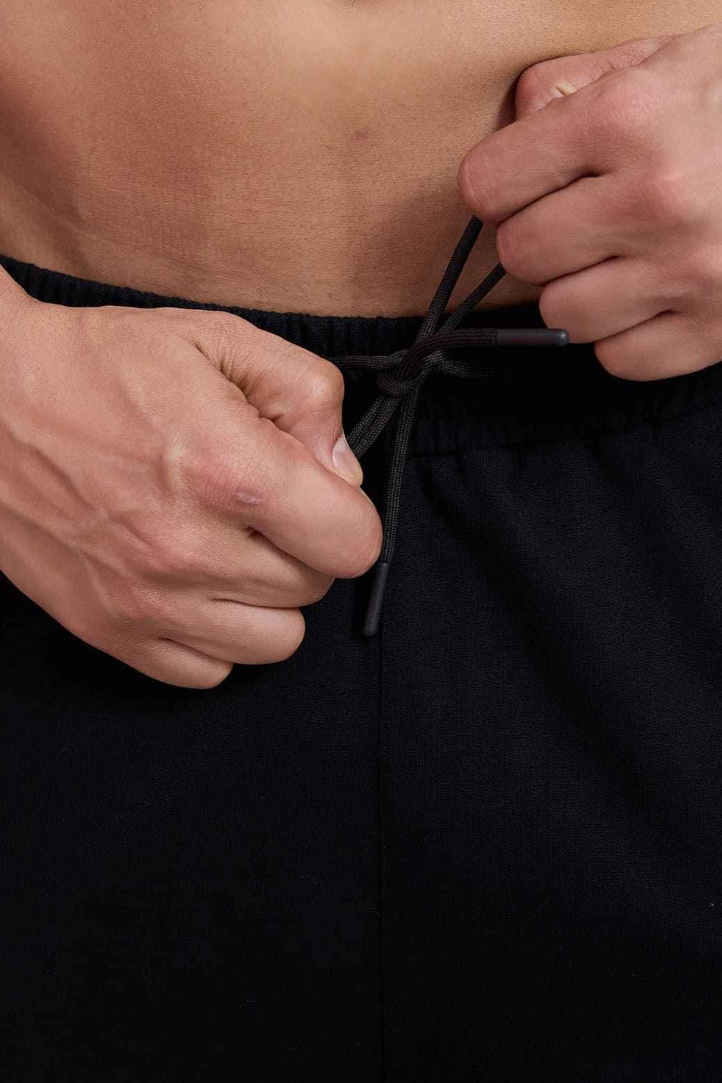 Fuaark Nz dark straight hair tracks pants in size XS, showcasing sleek, luxurious straight hair and stylish track pant design.