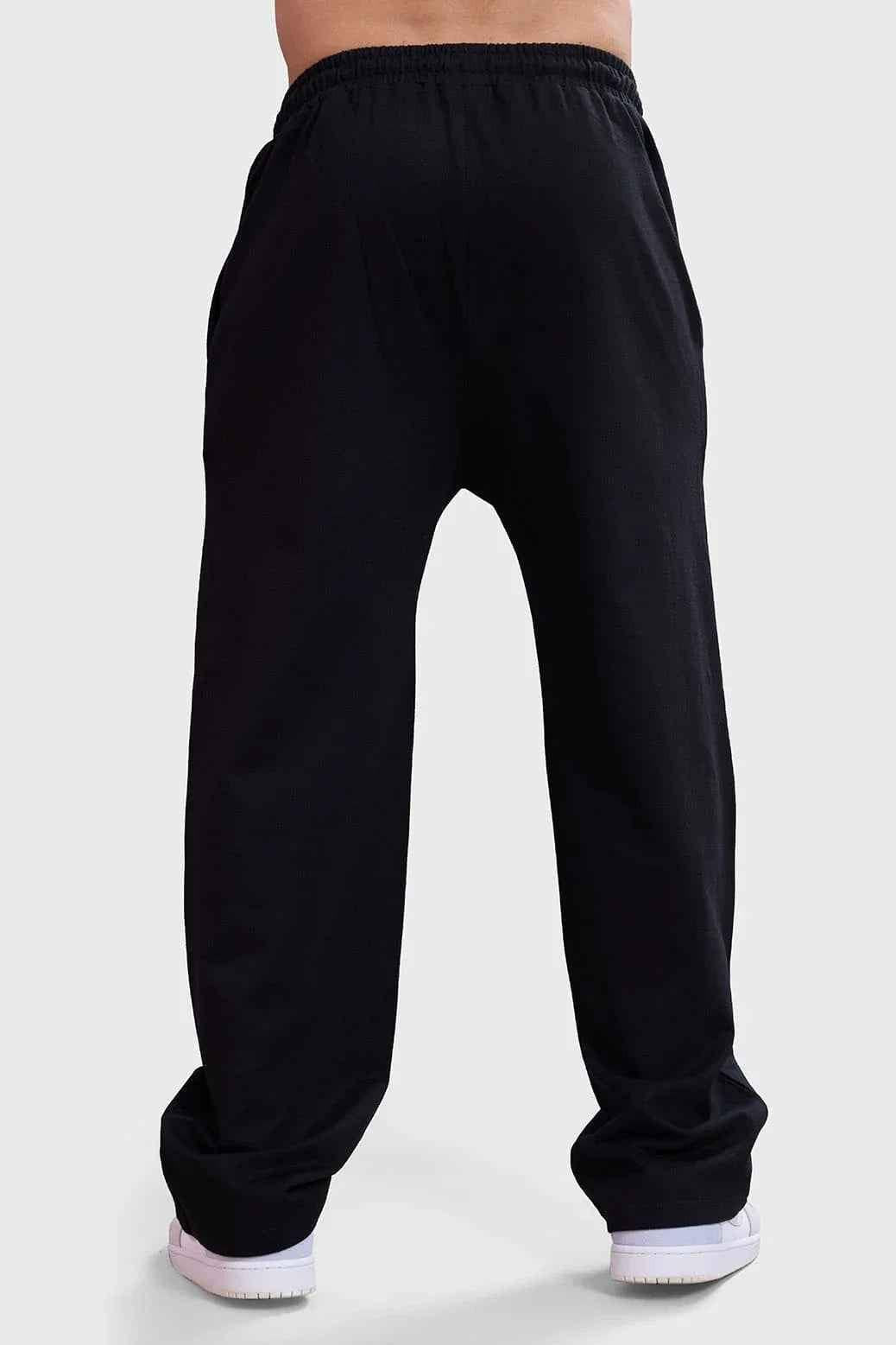 Fuaark Nz track pants in dark straight style, showcasing their luxurious fabric and sleek fit for effortless fashion.
