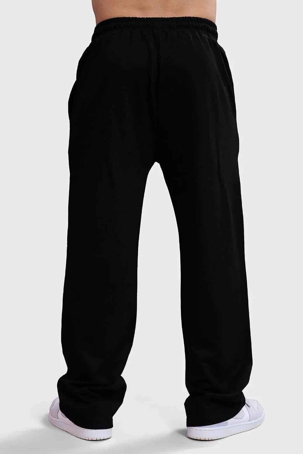 Black Phantom Straight Tracks track pants by Fuaark Nz, shown in XS size with a sleek, fitted design.