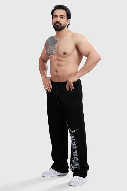 Black Ressiliant Straight Track Pants by Fuaark Nz, showing the fitted athletic design and elastic waistband.
