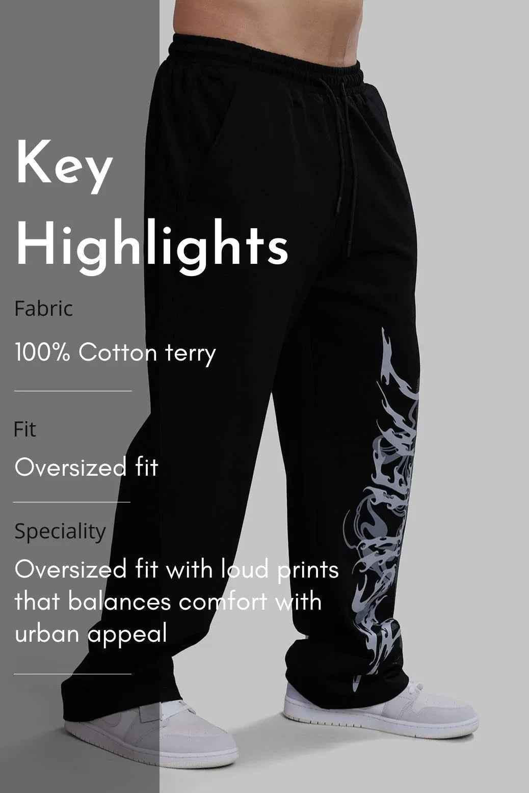 Fuaark NZ Ressiliant Straight Tracks Black track pants shown on a model, featuring a slim fit and modern athletic design.