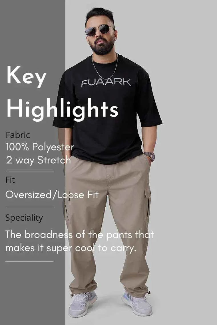 Beige Fuaark Nz carpenter cargo track pants with multiple pockets and relaxed fit, designed for durability and comfort.