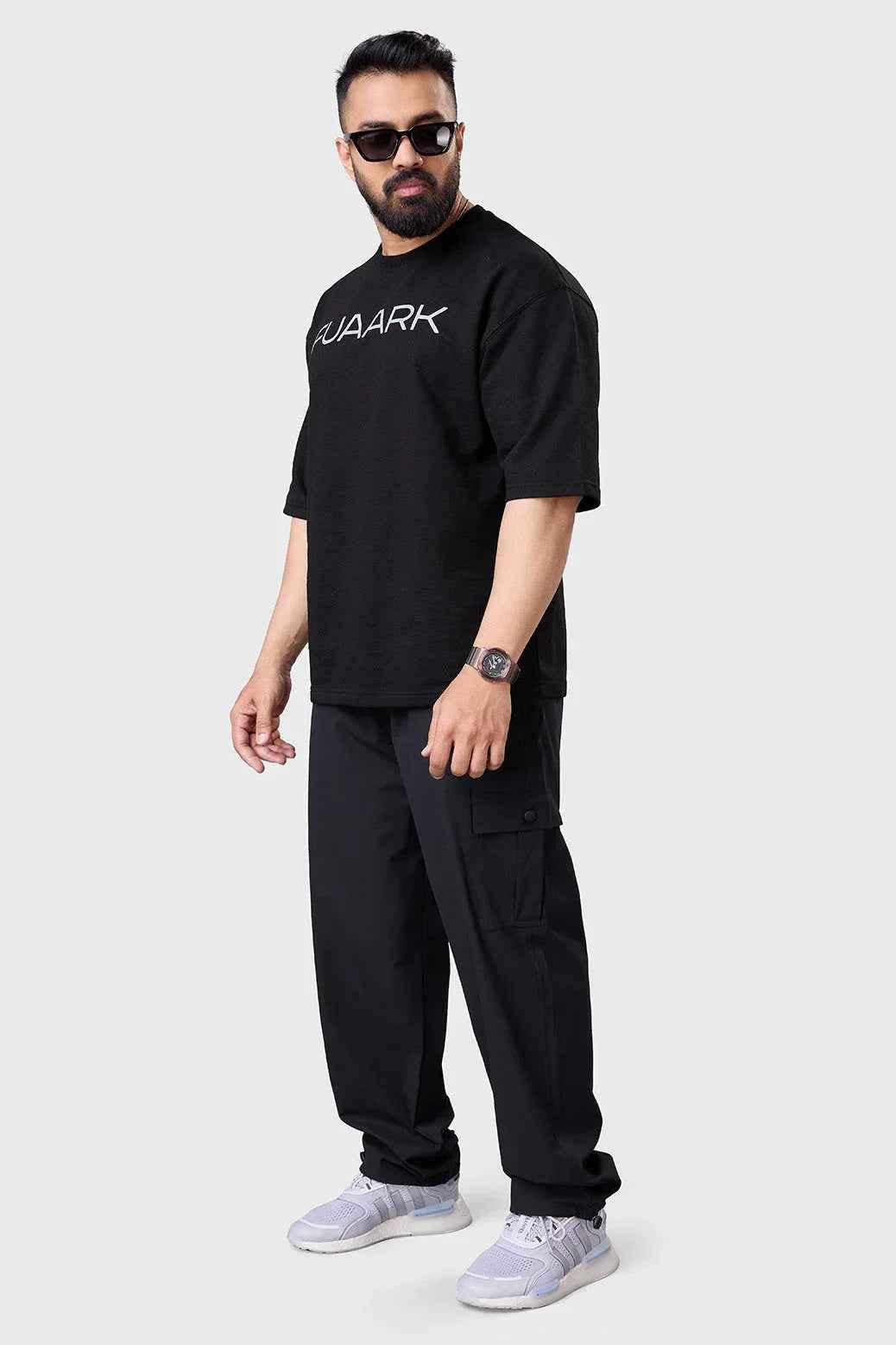 Black Fuaark Nz Carpenter Cargo Pants, stylish and durable track pants with multiple pockets and comfortable fit.