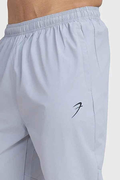 Light grey Fuaark Nz Essential Track Joggers with elastic waistband and drawstrings, displayed on a plain background.