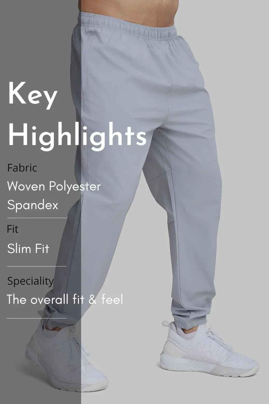 Light grey Fuaark Nz Essential Joggers track pants, slim fit with elastic waistband, shown on a model.