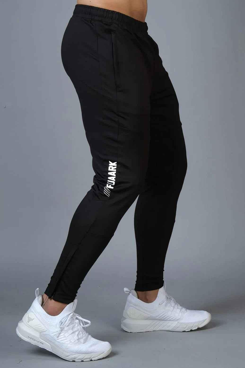 Fuaark Nz Hybrid Slim Tracks in black, lightweight and sleek track shoes with a modern design for athletic activities