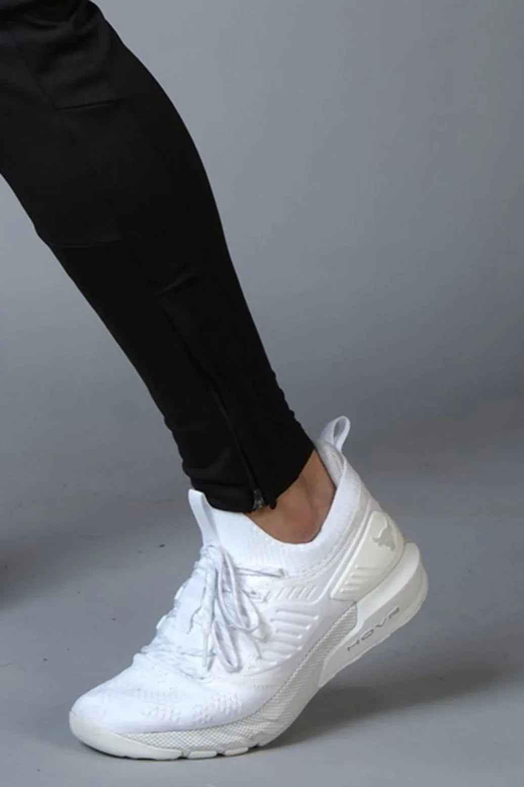 Fuaark Nz Hybrid Slim Tracks in black, sleek athletic track shoes with slim design and modern look.