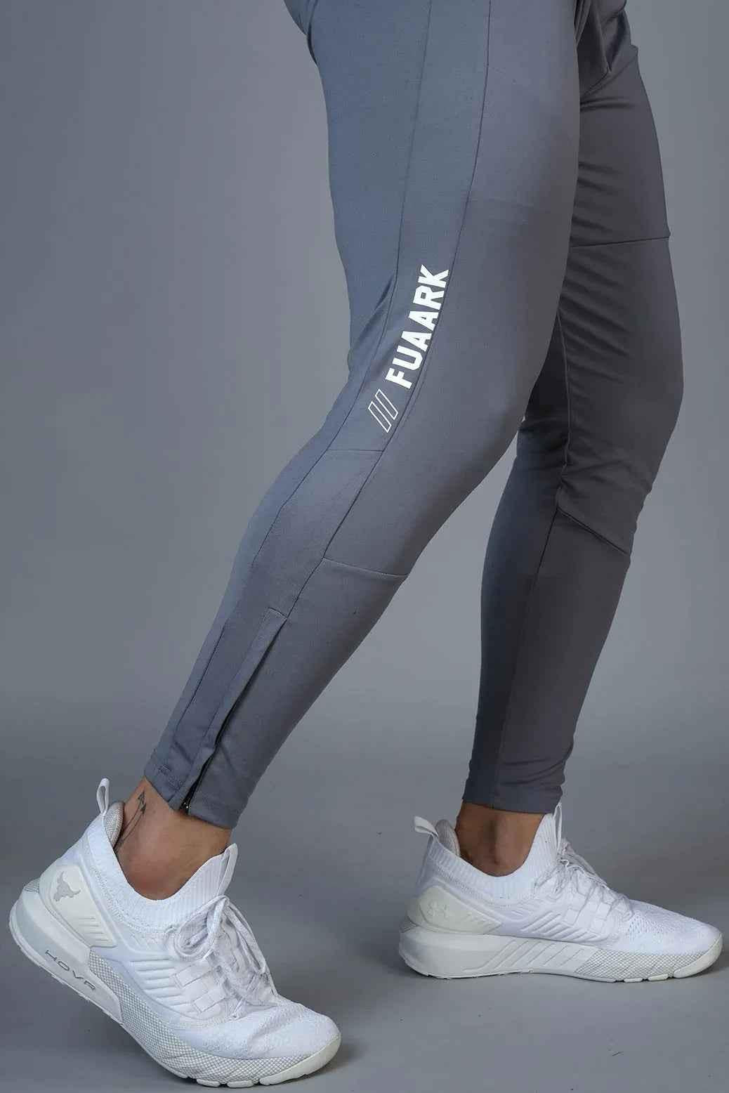 Fuaark Nz Hybrid Slim Track shoe with sleek design and performance-enhancing features, suitable for athletic and casual wear.