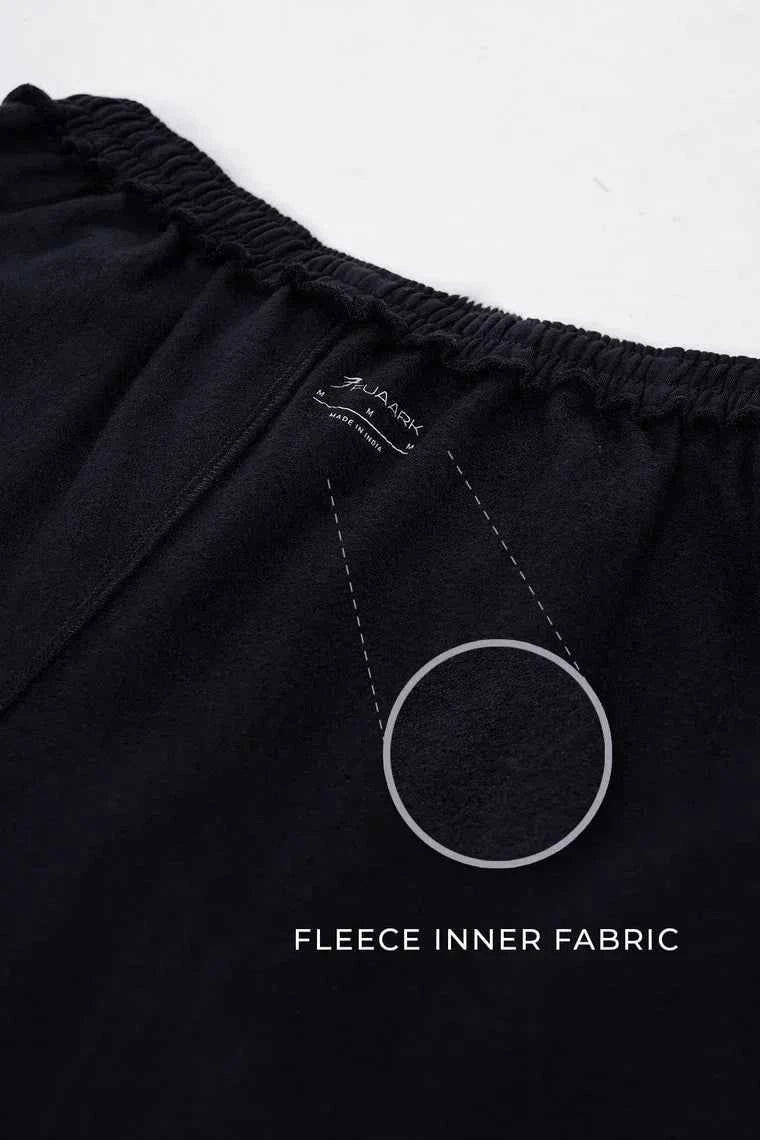 Fuaark Nz black relaxed fit track pants with a laidback style, designed for ultimate comfort and casual wear.