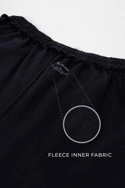Fuaark Nz black relaxed fit track pants with a laidback style, designed for ultimate comfort and casual wear.