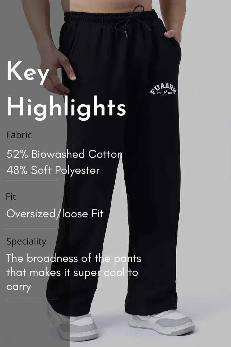 Fuaark NZ black relaxed fit track pants for ultimate comfort, laidback style, with a comfortable waistband and tapered legs.