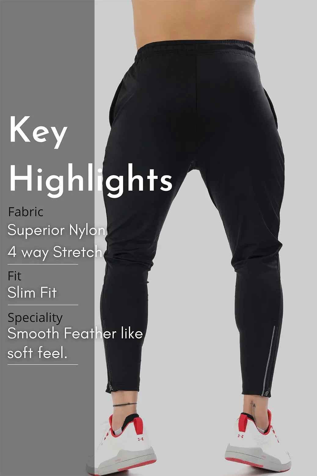 Black Nylon Supreme Tracks by Fuaark Nz, showcasing sleek nylon fabric, elastic waistband, and sporty track design.
