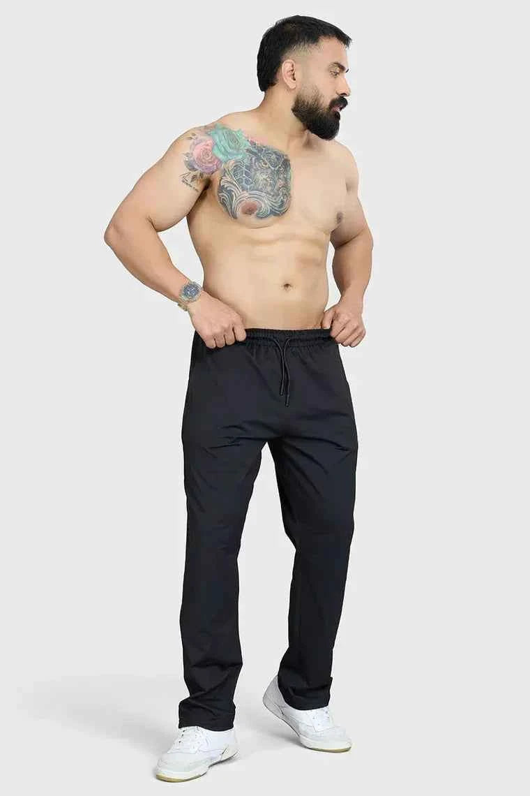 Fuaark Nz smart casual black track pants with a sleek fit, ideal for comfort and everyday style.