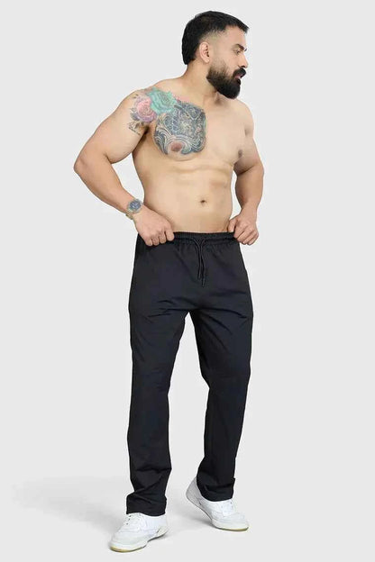 Fuaark Nz smart casual black track pants with a sleek fit, ideal for comfort and everyday style.