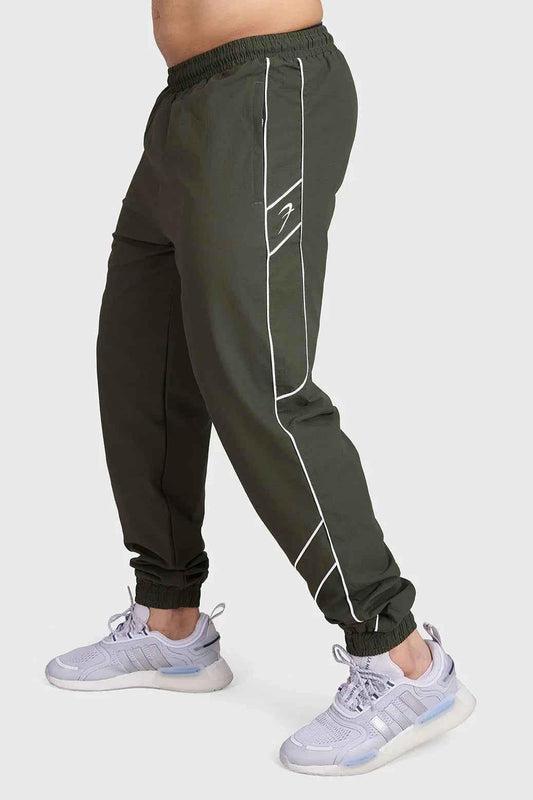 Fuaark NZ sprint joggers in army green, designed for running and training, featuring a comfortable track pant fit.
