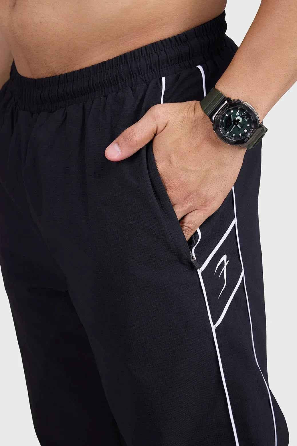 Black Fuaark Nz men's sprint track joggers, showcasing a comfortable fit and athletic style for active performance.