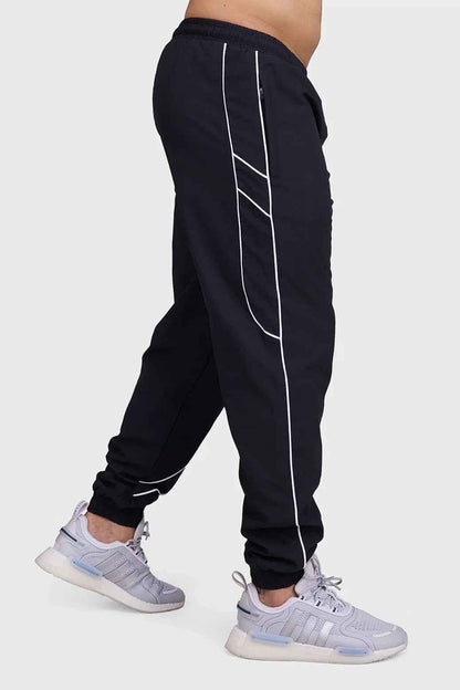 Black Fuaark Nz men's sprint joggers for track and activewear, designed for comfort and performance during workouts.
