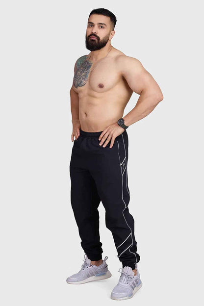 Black Fuaark Nz men's sprint joggers, lightweight track activewear designed for comfort and performance.
