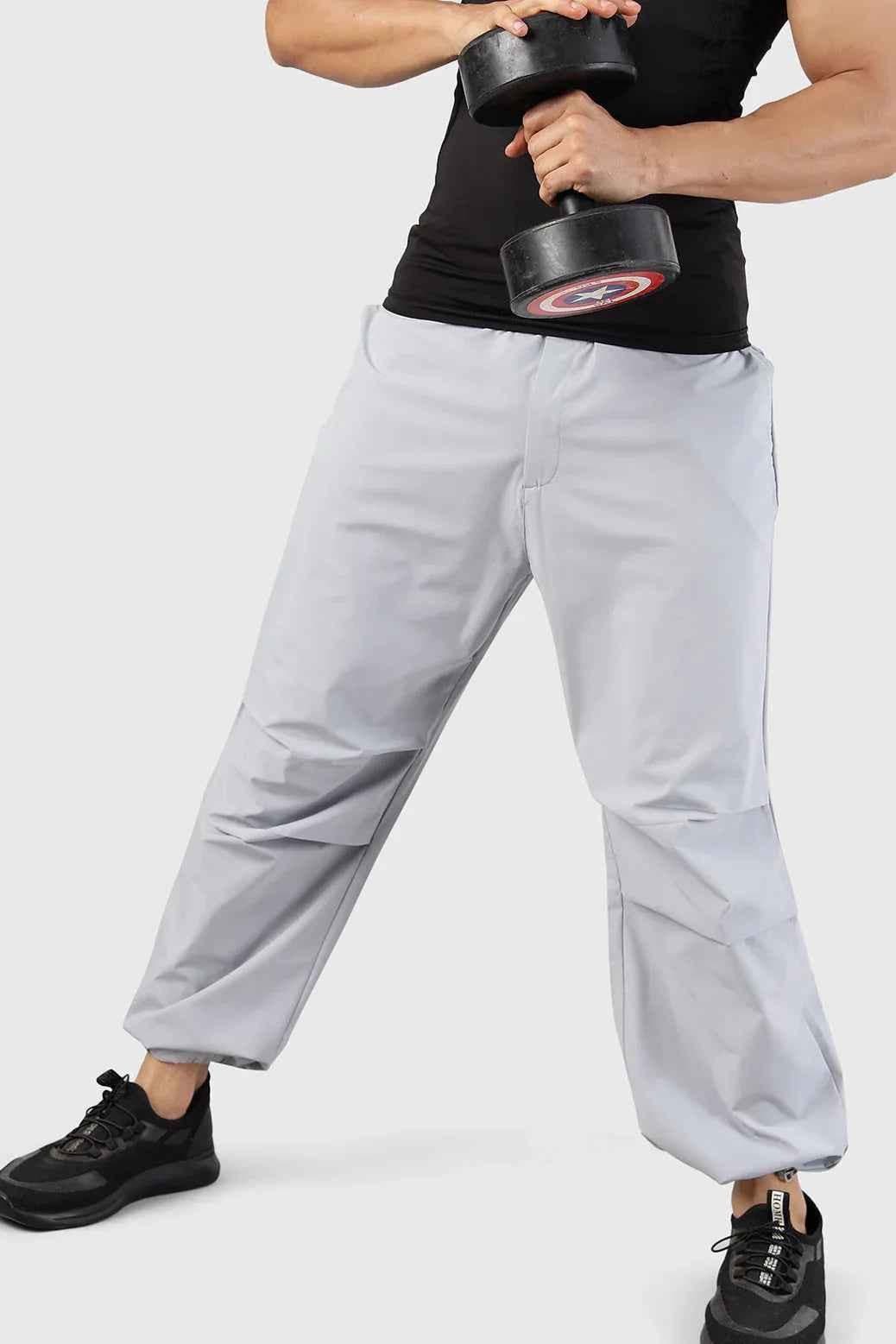 Light grey Fuaark Nz Sublime Parachute Pants track pants with relaxed fit and adjustable waistband, casual and comfortable style.