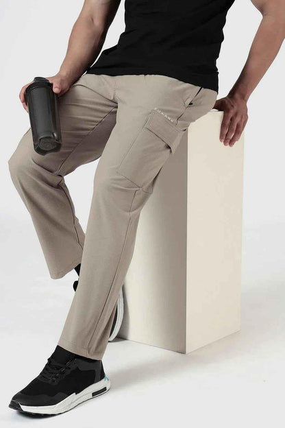 Beige Fuaark Nz Vitality Straight Pants track pants laid flat showing front and side details.