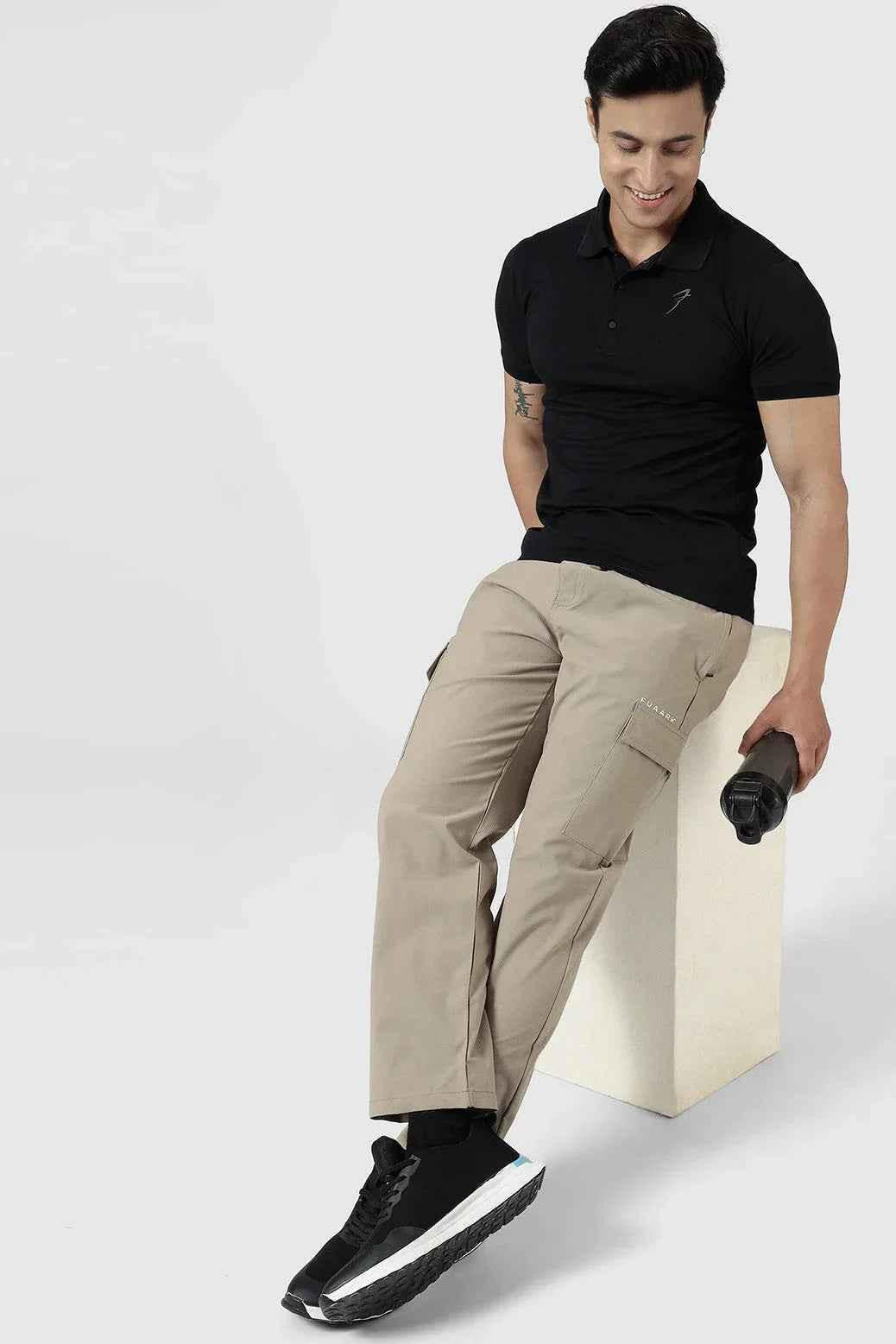 Beige Fuaark Nz Vitality Straight Pants track pants with a relaxed fit, front pockets, and elastic waistband.