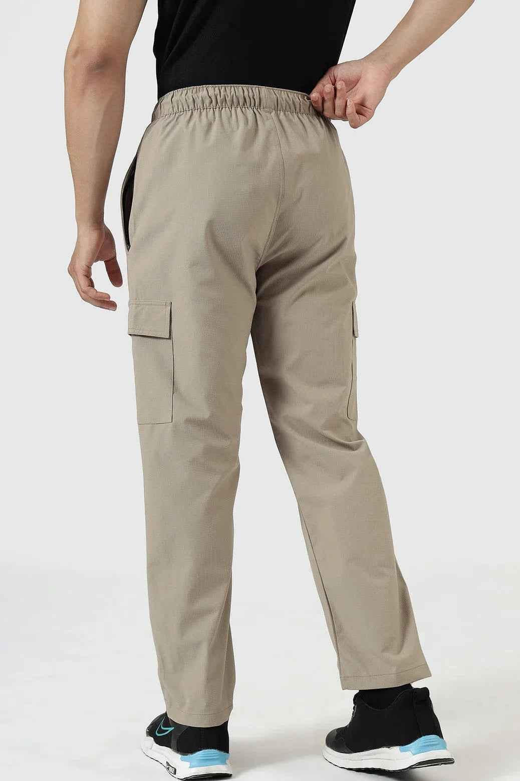 Beige Fuaark Nz Vitality Straight Track Pants displayed with a relaxed fit and elastic waistband.